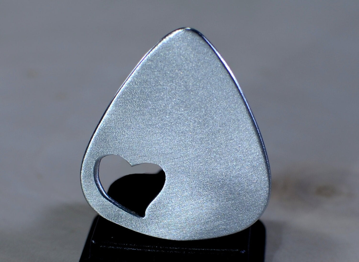 Love Guitar Pick with Cutout Heart in various metals