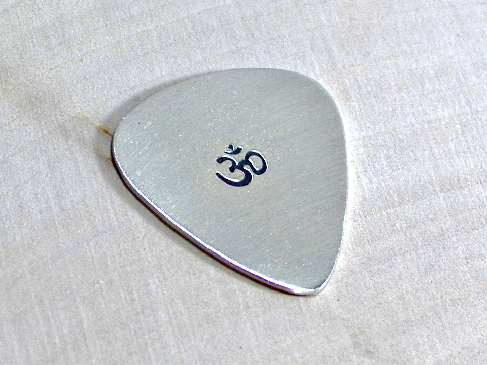 OM Sterling silver guitar pick