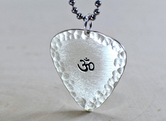 Om on sterling guitar pick necklace