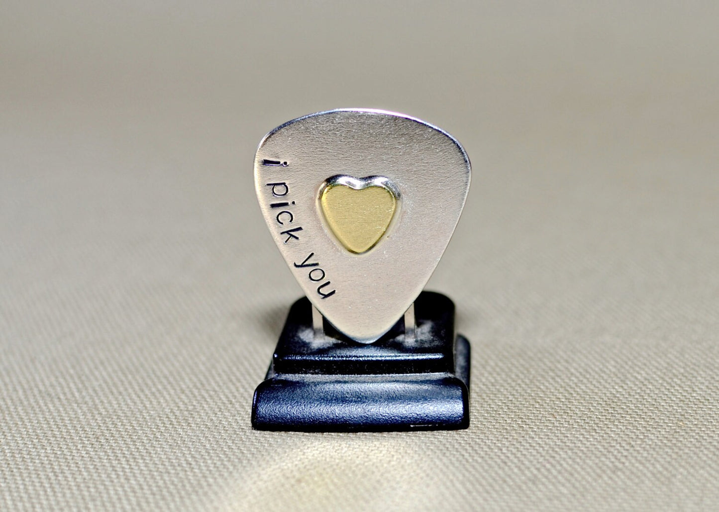 Sterling silver guitar pick and brass heart handcrafted with love