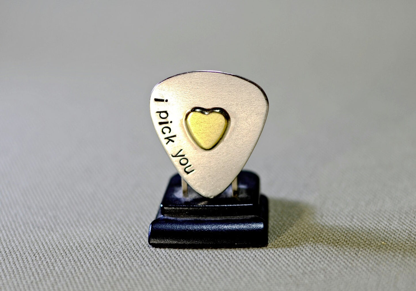 Sterling silver guitar pick and brass heart handcrafted with love