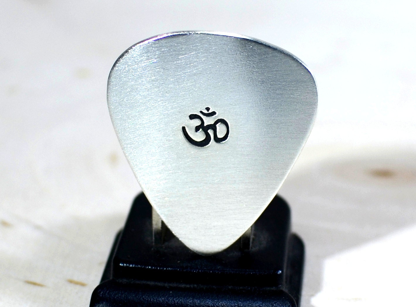 OM Sterling silver guitar pick