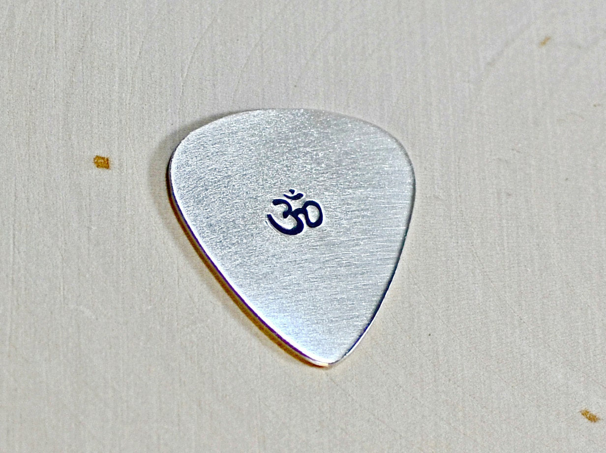 OM Sterling silver guitar pick