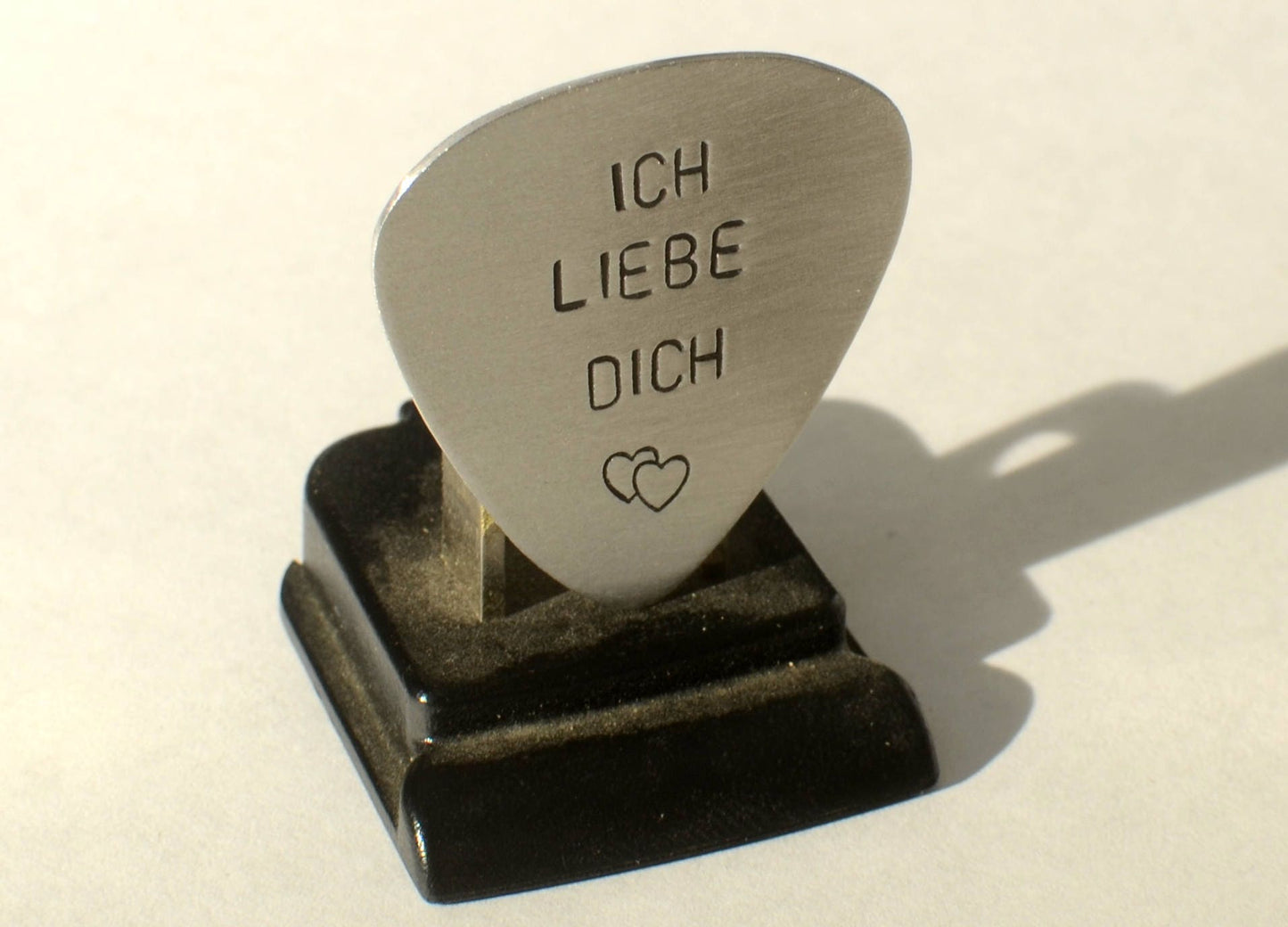 Sterling silver guitar pick with Ich liebe dich and a heart