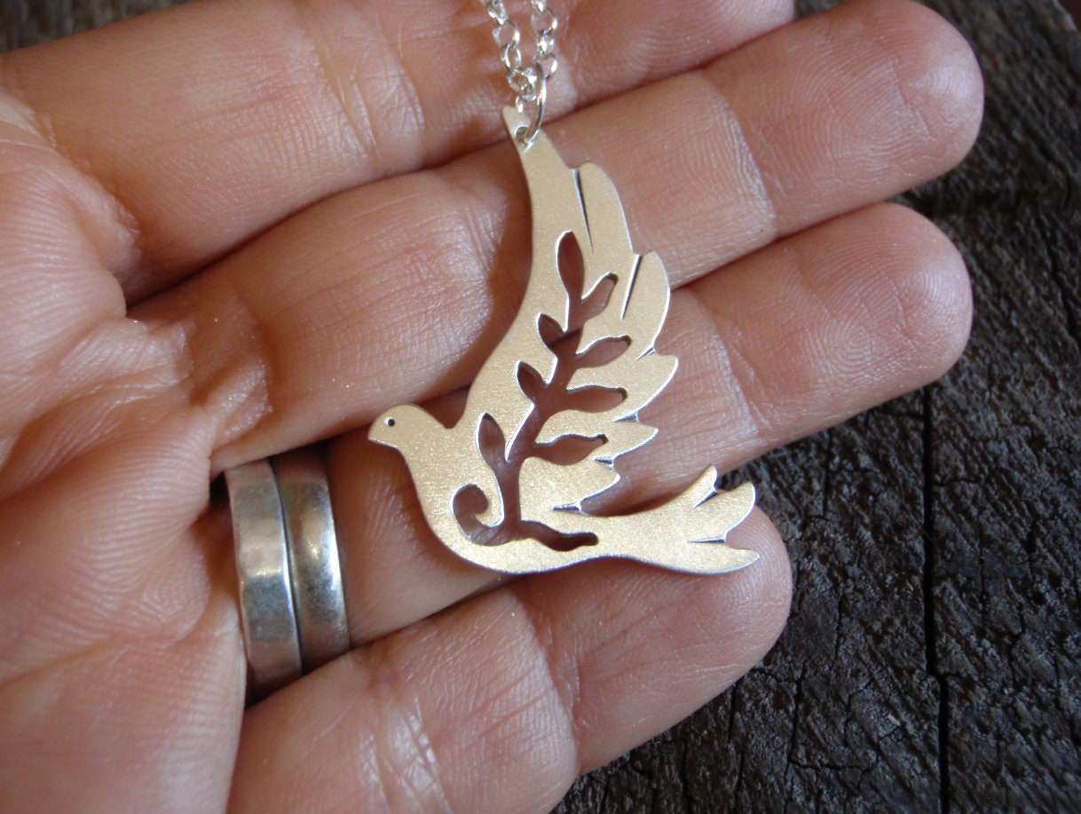 Sterling silver dove necklace with leaves cut out