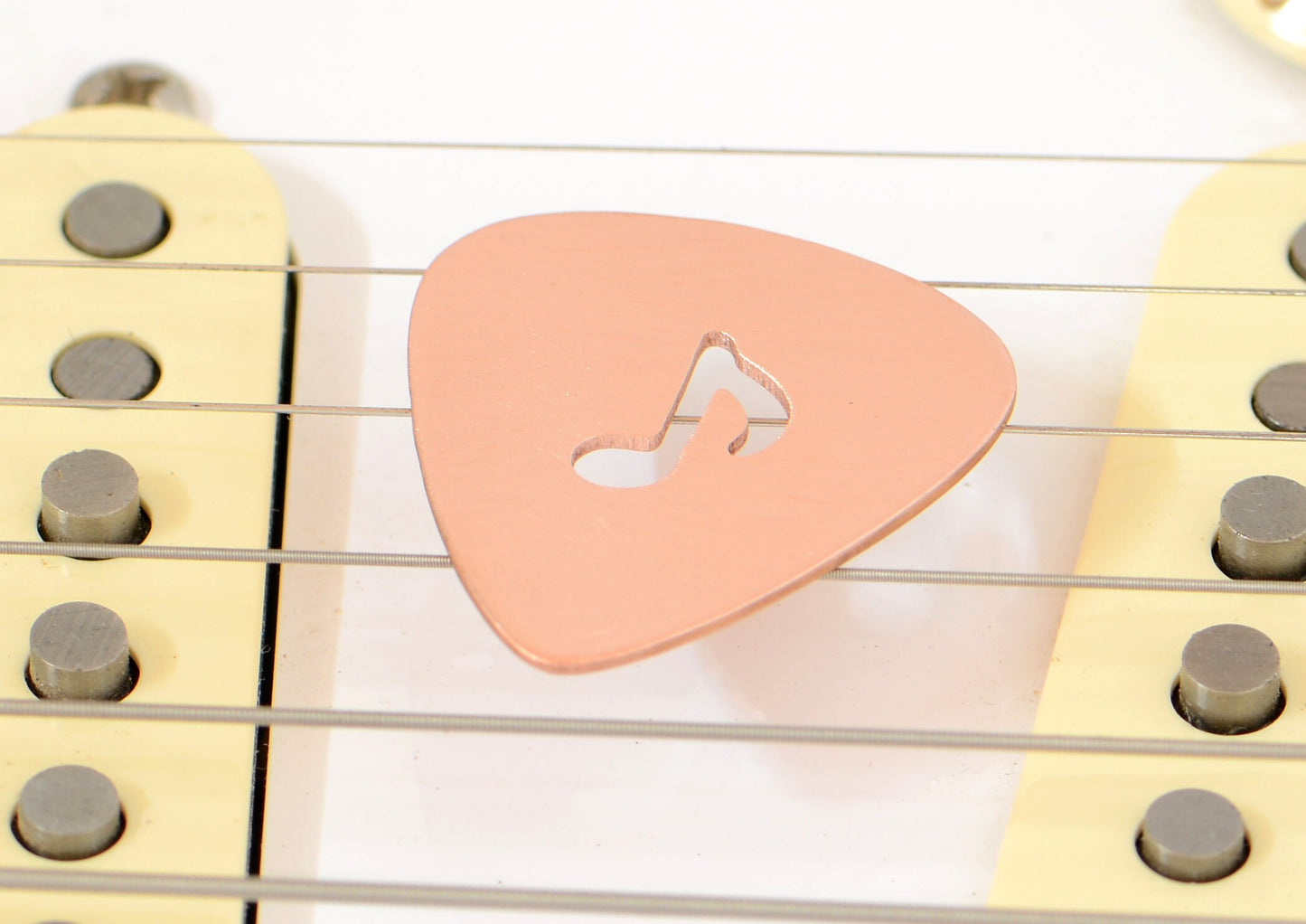 Copper Guitar Pick with 8th Note as Musical Inspiration to keep you Rocking