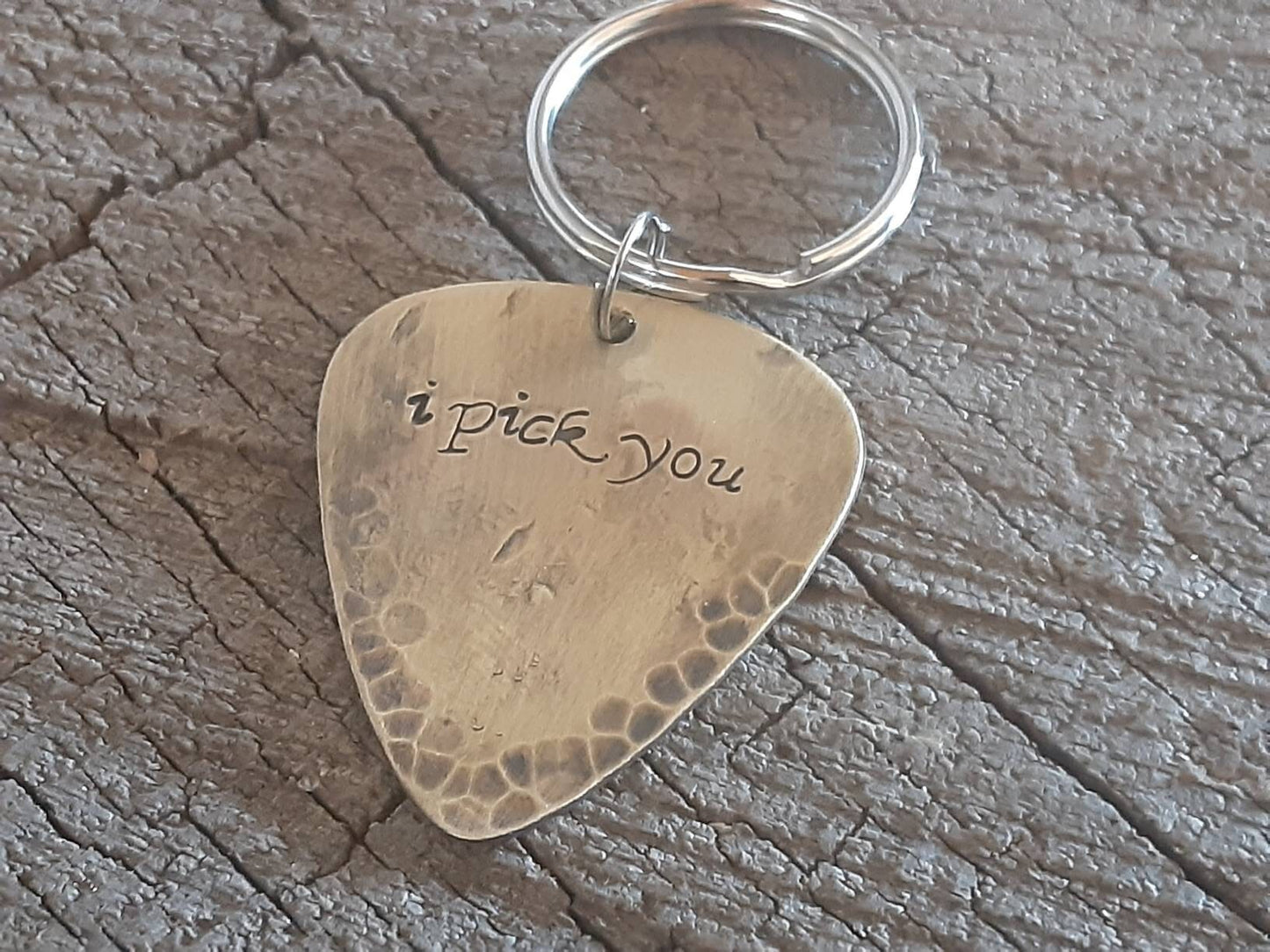 I pick you brass guitar pick key chain in a distressed and rustic finish