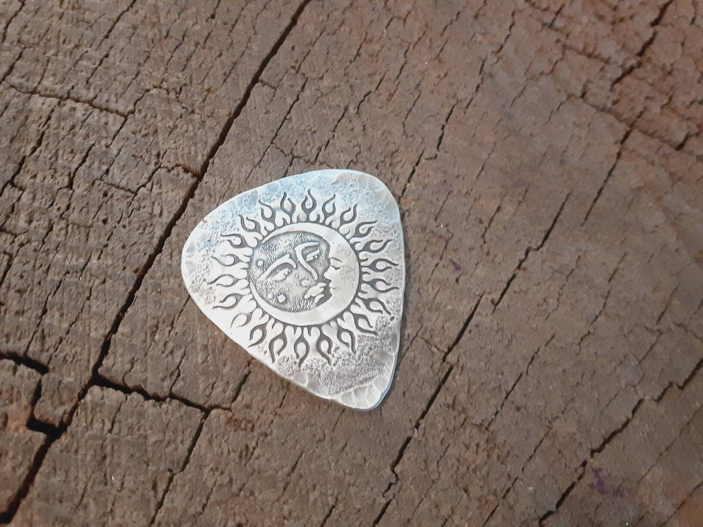 Sterling silver guitar pick with sun moon and stars