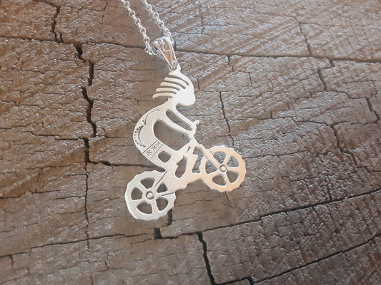 Kokopelli on mountain bike sterling silver necklace