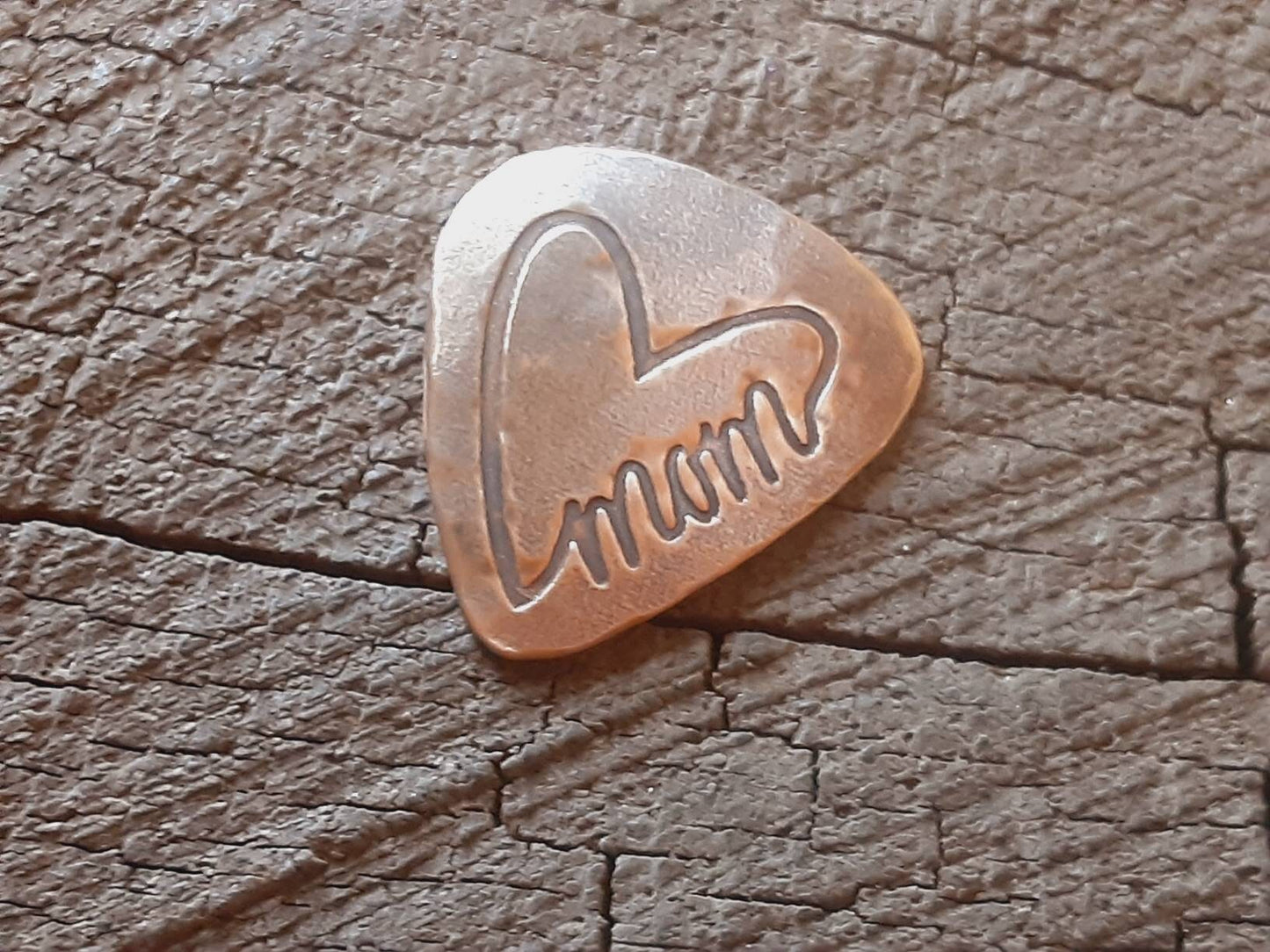 Mom guitar pick in bronze