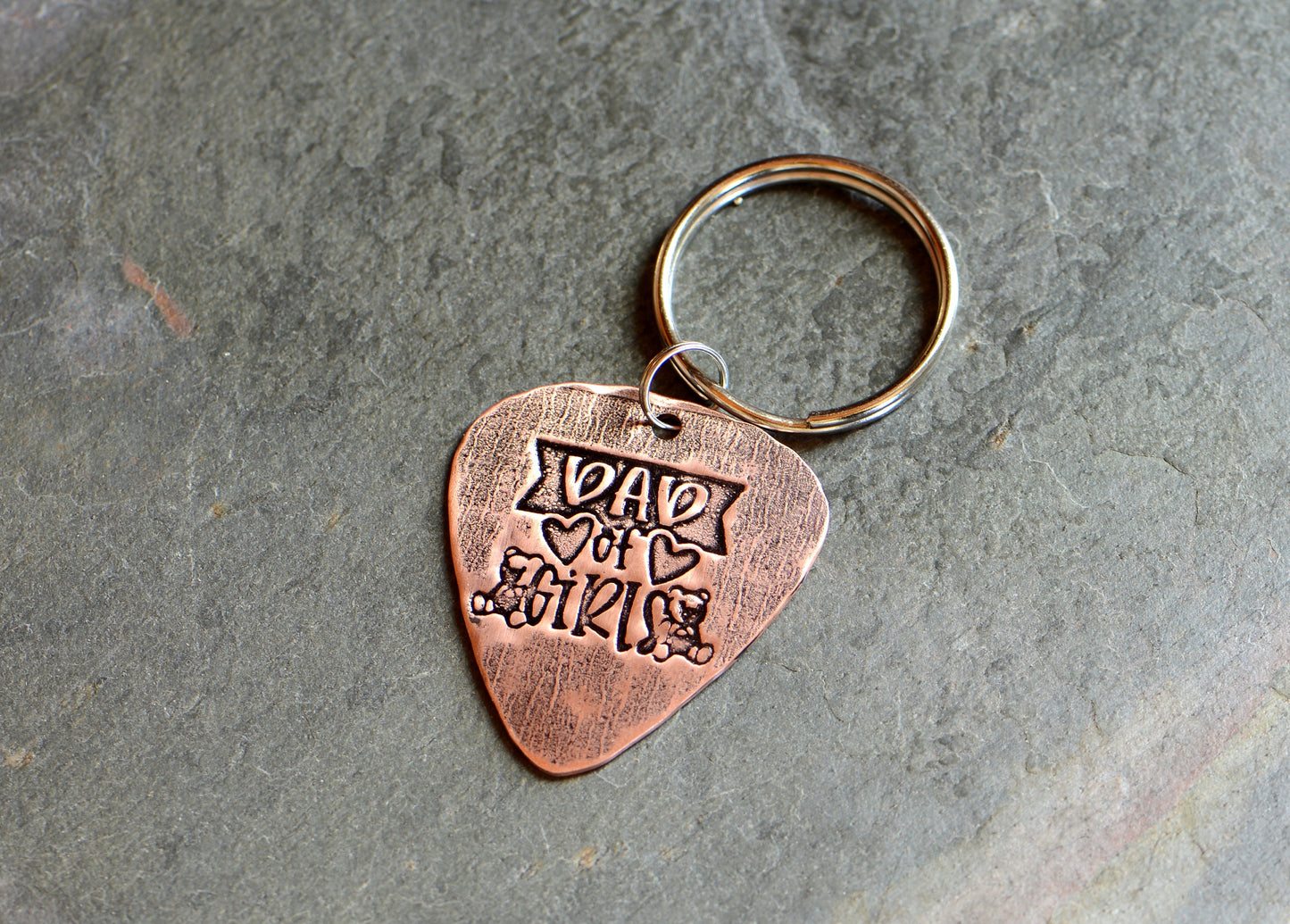 Copper guitar pick keychain stamped with dad of girls