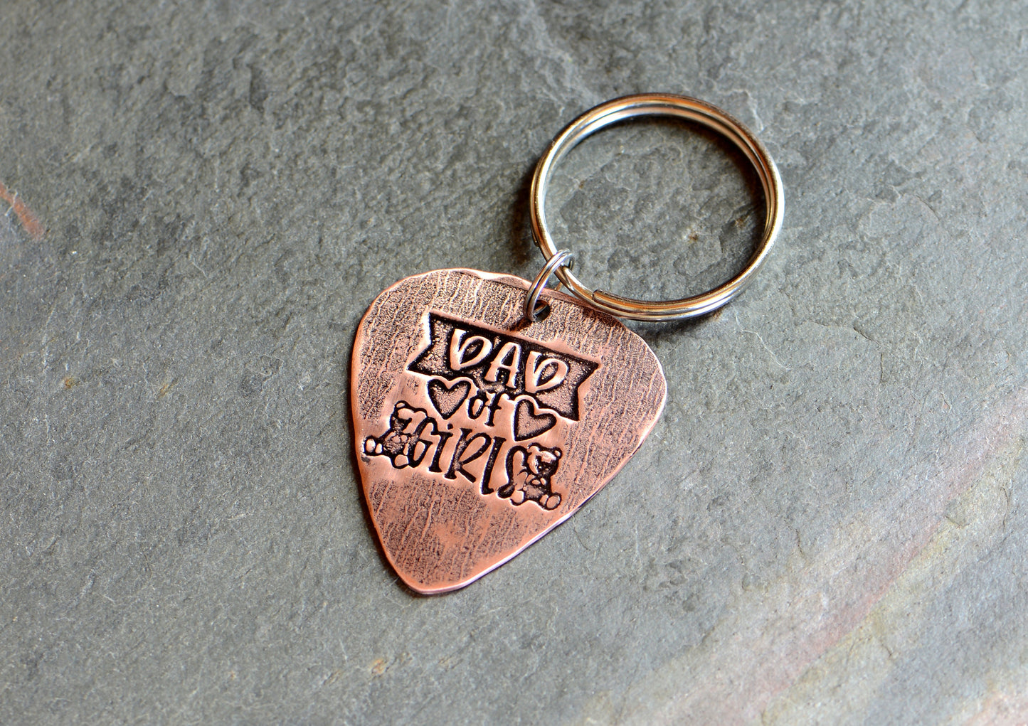 Copper guitar pick keychain stamped with dad of girls