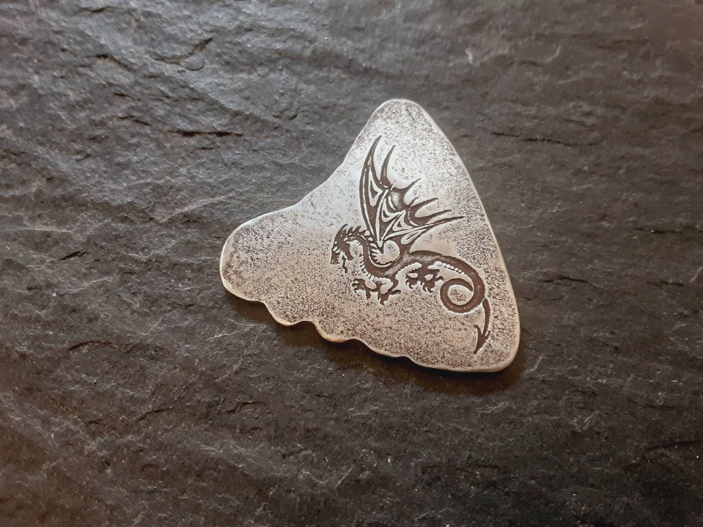 Sterling silver shark tooth guitar pick with dragon design