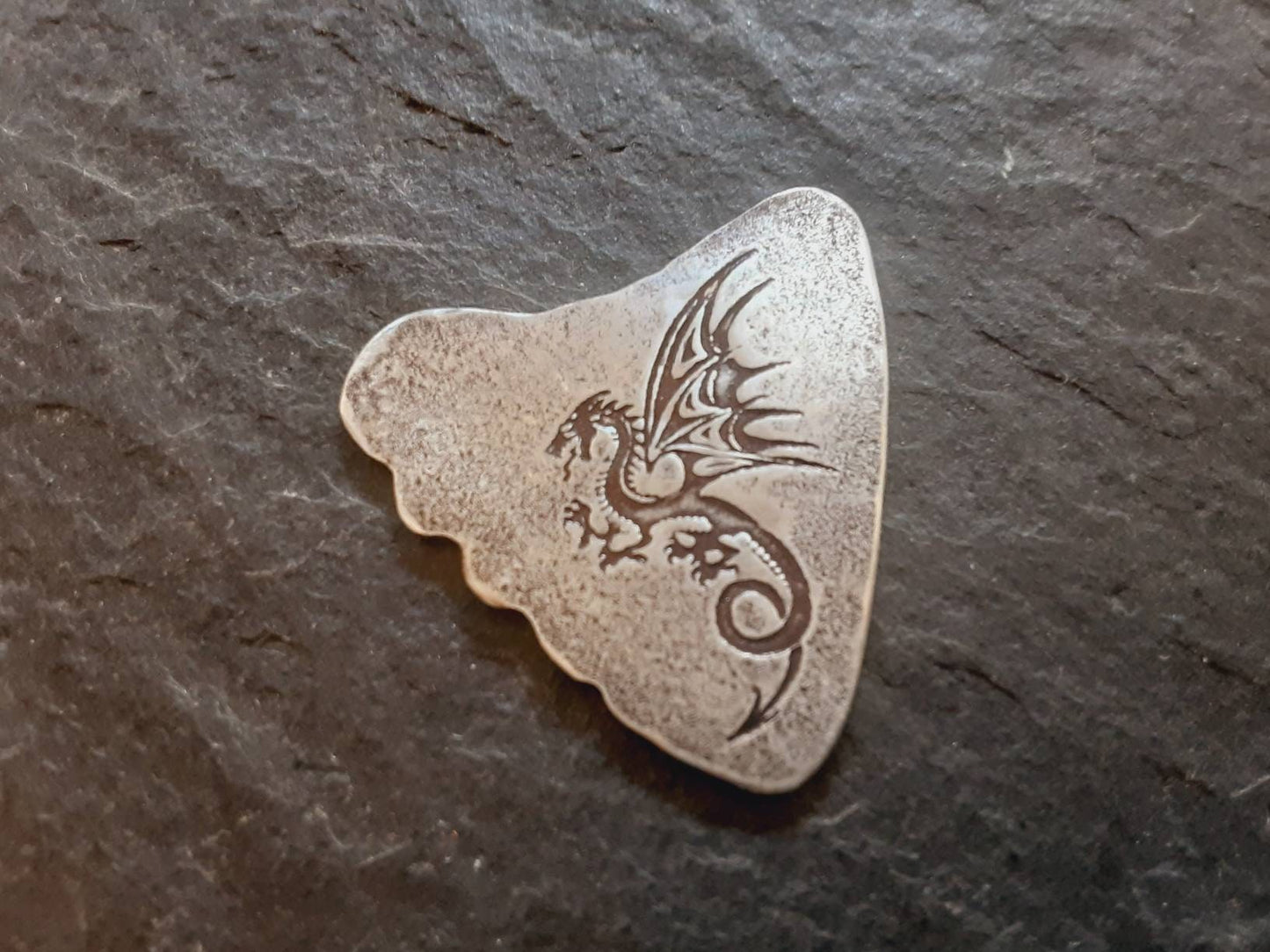 Sterling silver shark tooth guitar pick with dragon design