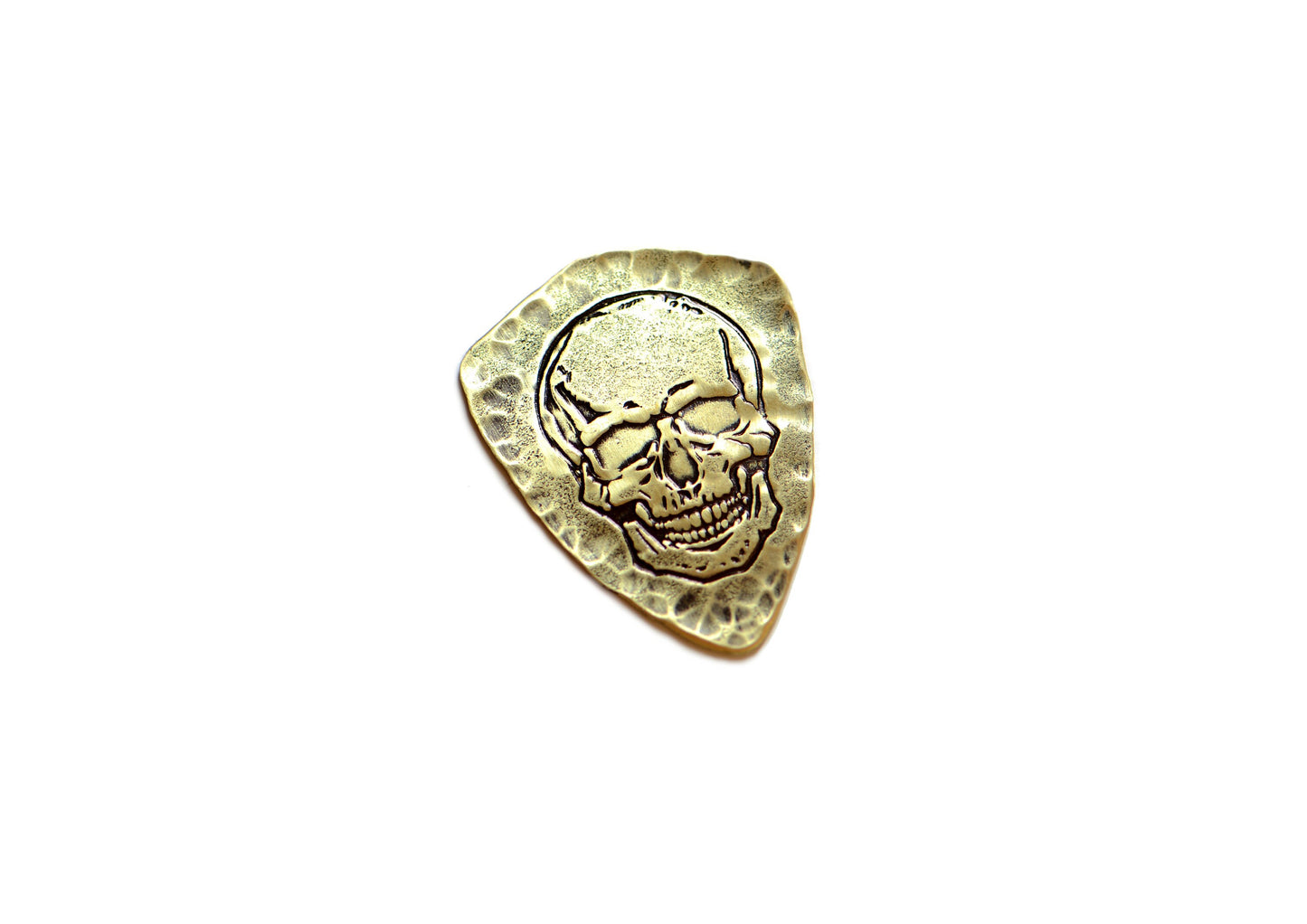 Shield style brass guitar pick with skull design