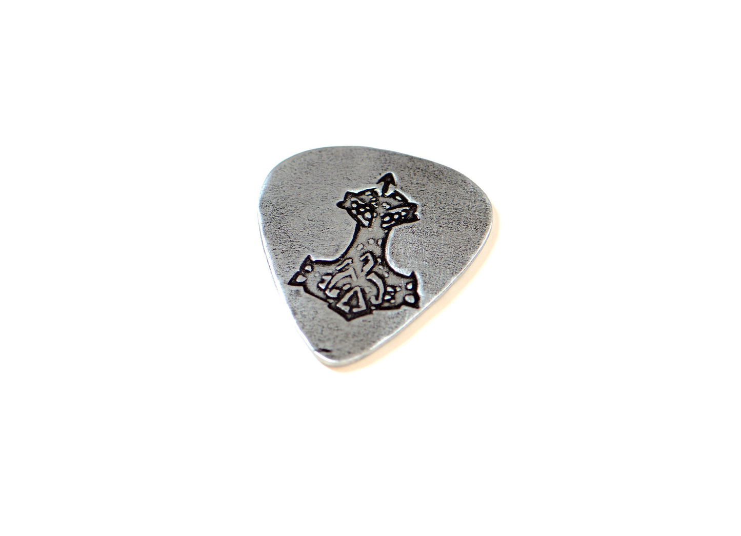 Sterling silver guitar pick stamped with Thors hammer