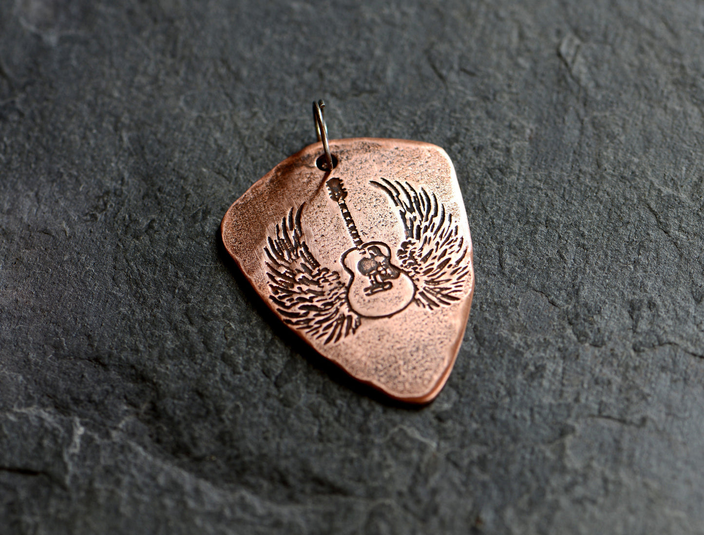 Shield shaped copper guitar pick