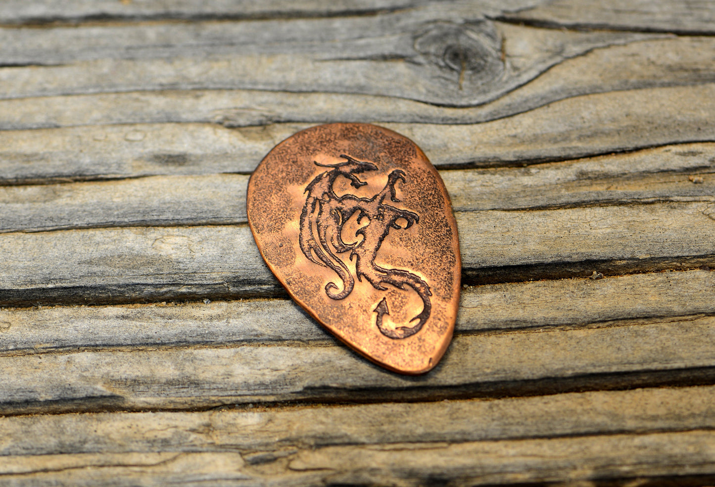 copper tear drop guitar pick with dragon - playable - NicisPicks