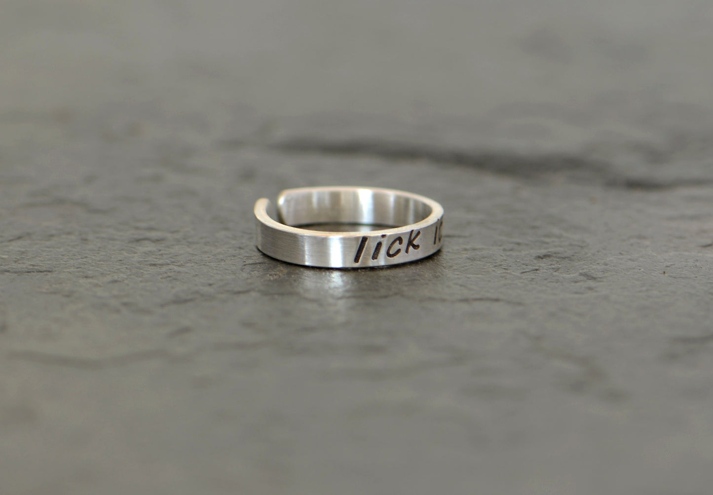 Sterling silver toe ring stamped with lick it